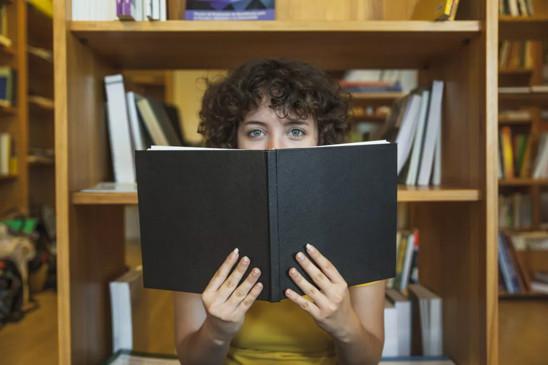 teen-girl-hiding-face-book